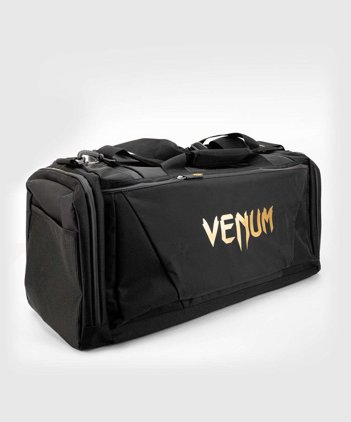 Bolsa deportiva Venum trainer lite evo (negro/oro)2