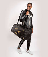 Bolsa deportiva Venum trainer lite evo negro oro