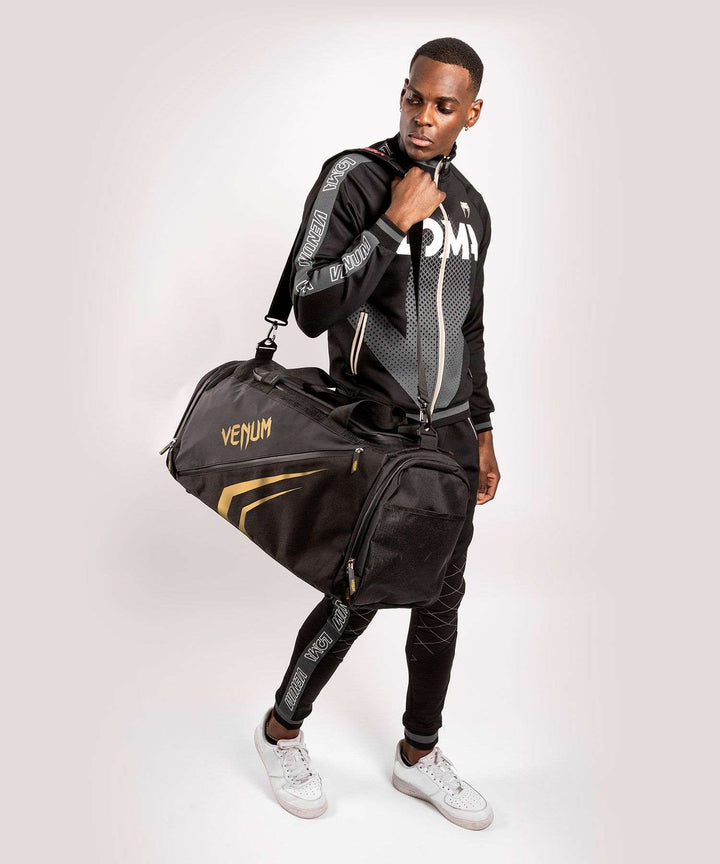Bolsa deportiva Venum trainer lite evo (negro/oro)8