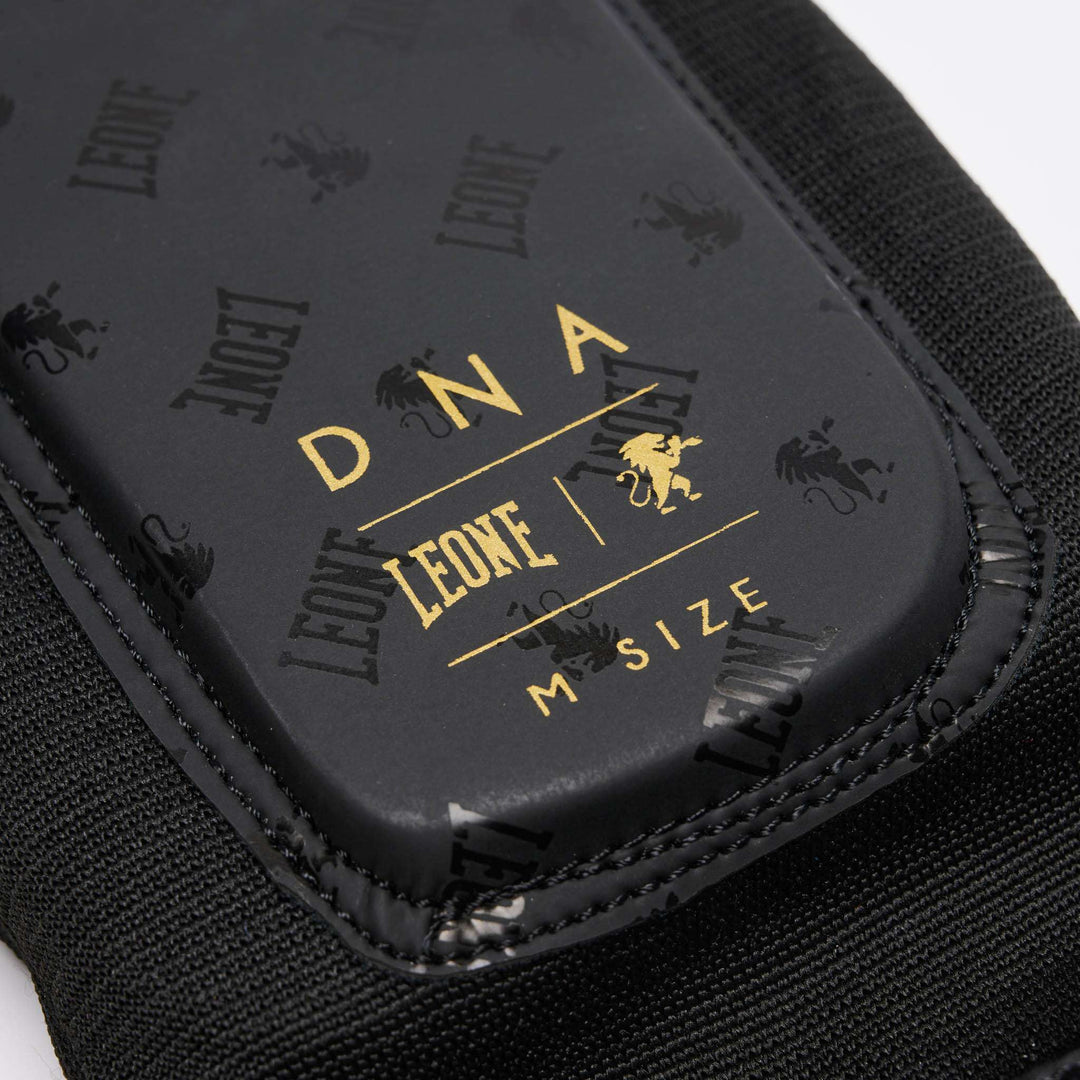 Espinilleras MMA Leone 1947 DNA (negro/oro) 1