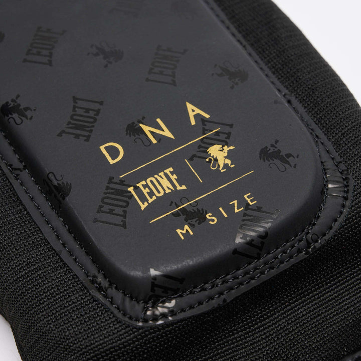 Espinilleras MMA Leone 1947 DNA (negro/oro) 1