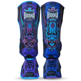 Espinilleras muay thai Buddha luzbel