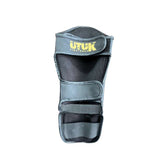 Espinilleras kick boxing Utuk infantiles negro oro