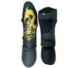 Espinilleras muay thai Utuk hunter negro oro