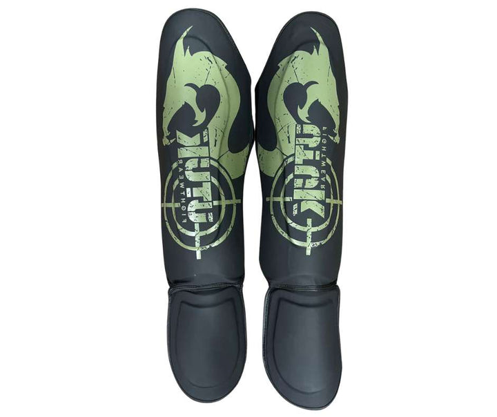 Espinilleras muay thai Utuk hunter negra verde 1