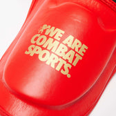 Espinilleras muay thai Leone DNA roja