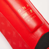 Espinilleras muay thai Leone DNA roja