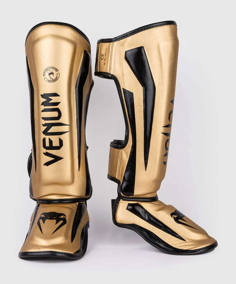 Espinilleras muay thai Venum elite standup oro negro
