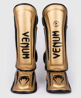 Espinilleras muay thai Venum elite standup oro negro