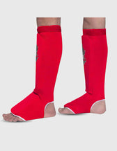Espinilleras muay thai Buddha tubulares rojas