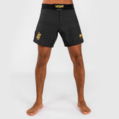 Venum x ares fight shorts negro oro