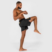 Venum x ares fight shorts negro oro