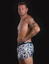Pantalón muay thai Buddha colorsTrike noir blossom